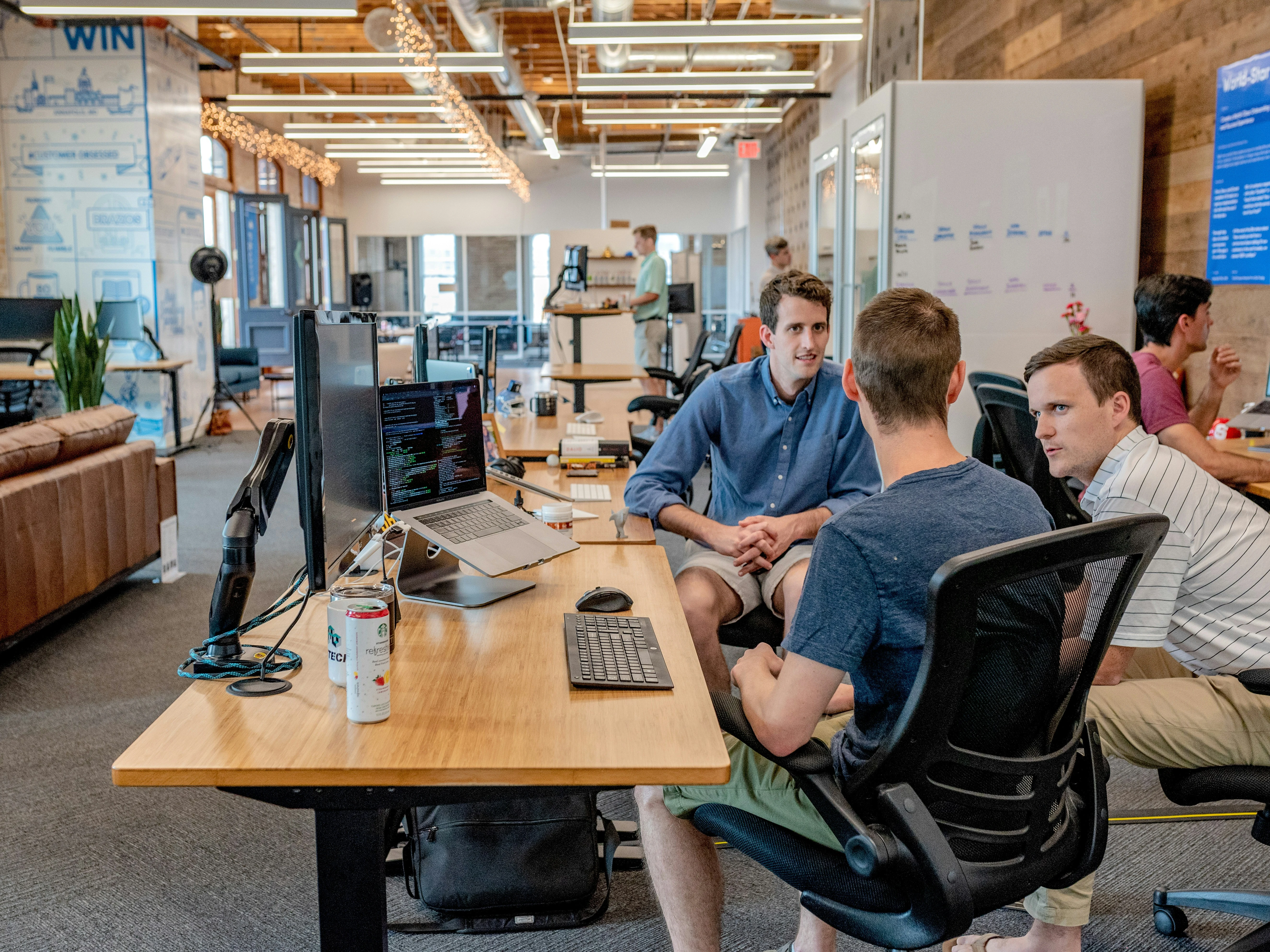 Team collaborating with shared agents